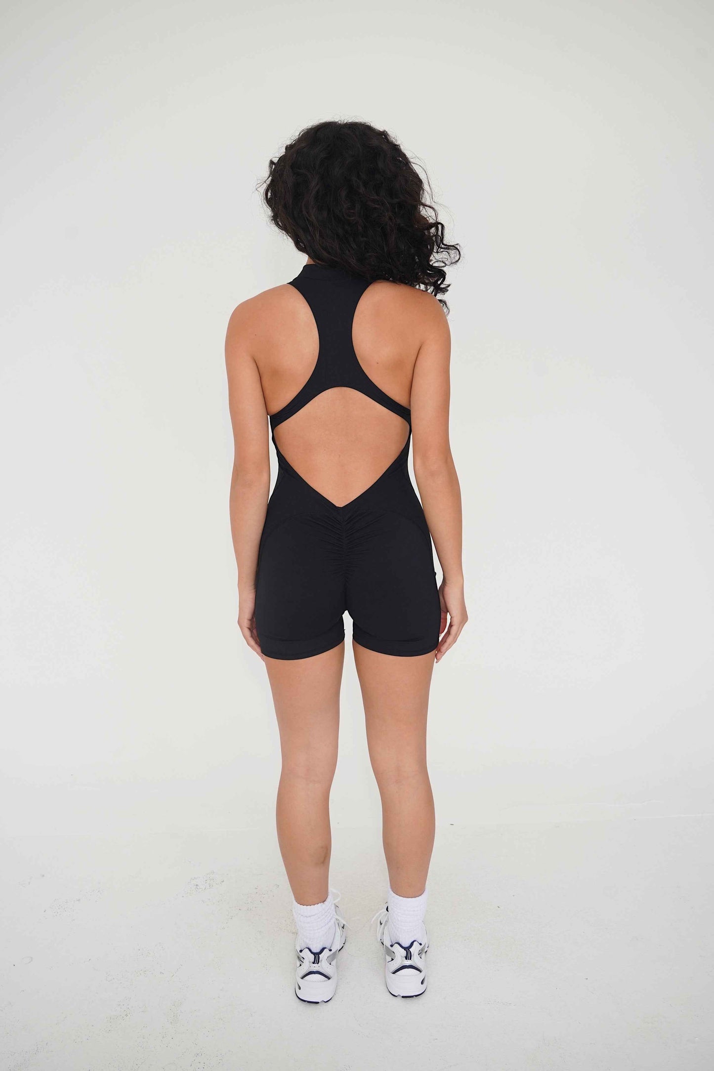 I am Limitless Zipper Bodysuit in Black