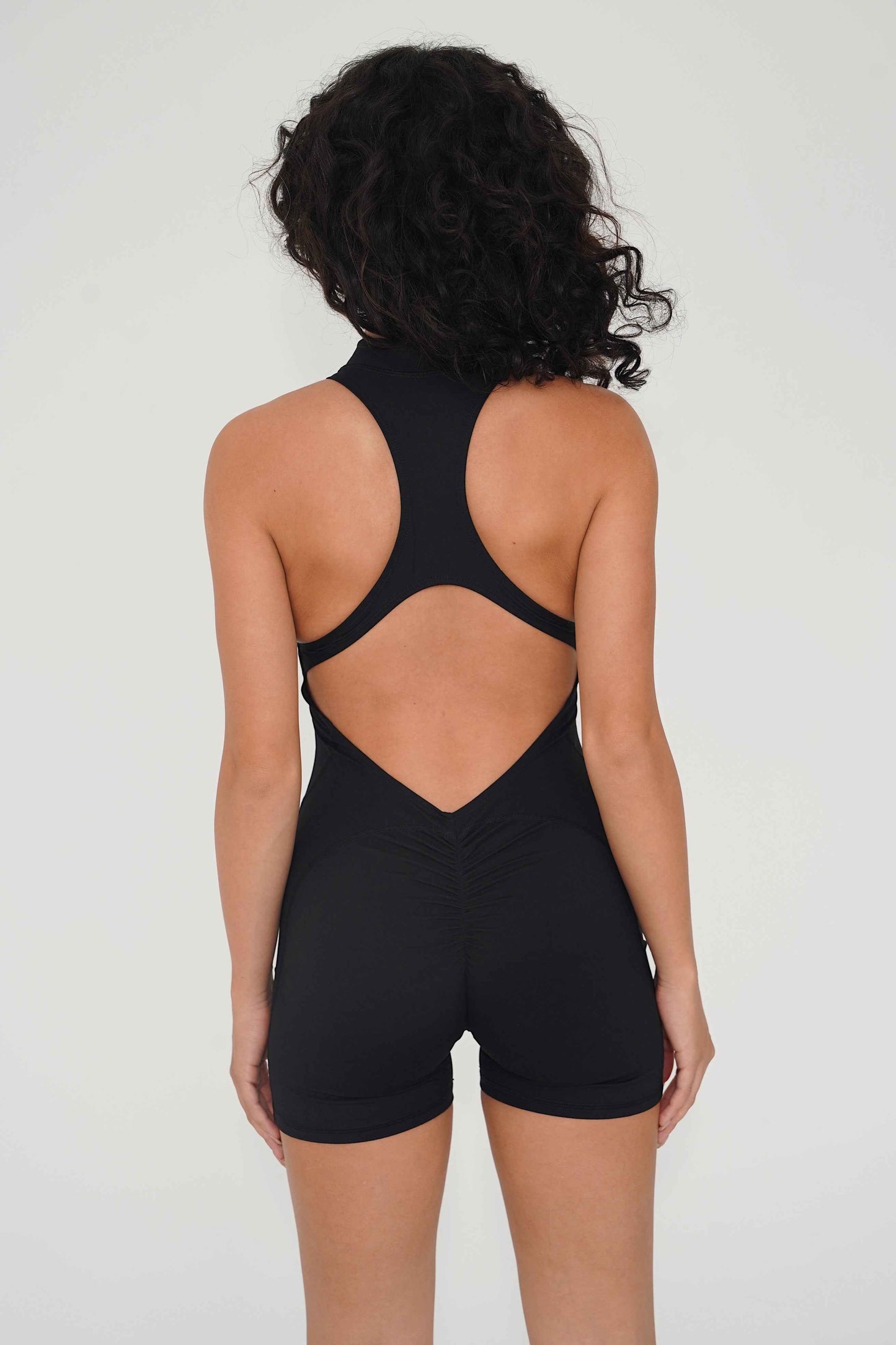 I am Limitless Zipper Bodysuit in Black
