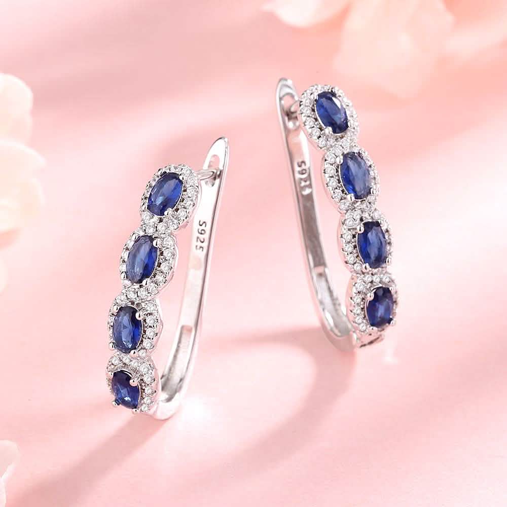 Sapphire Halo Simulated Huggie Earrings in Sterling Silver DailySale