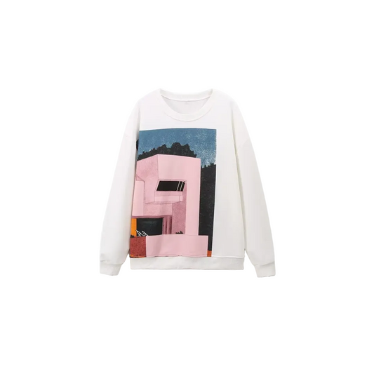 Front view of model wearing a cozy oversized printed sweatshirt with bold graphics