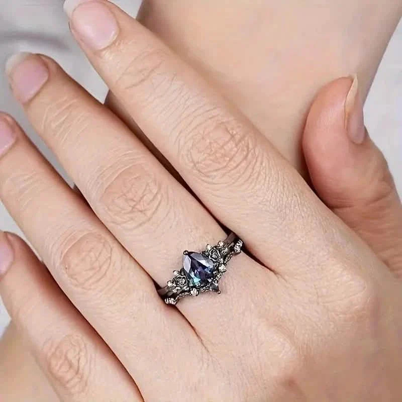2-Piece Set: Gothic Black & Golden Engagement Ring Set with Pear-Shaped Cubic Zirconia DailySale