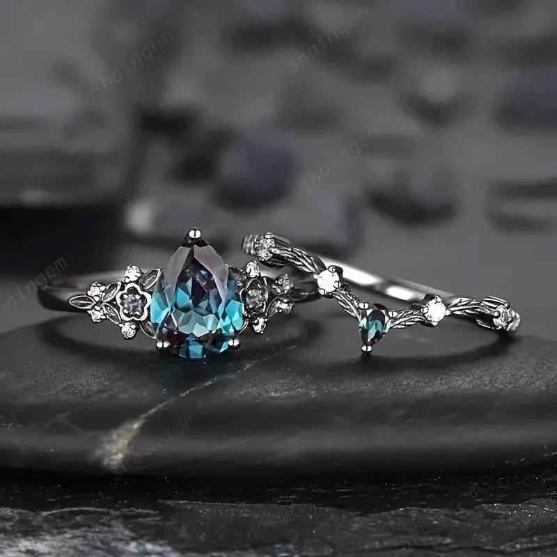 2-Piece Set: Gothic Black & Golden Engagement Ring Set with Pear-Shaped Cubic Zirconia DailySale
