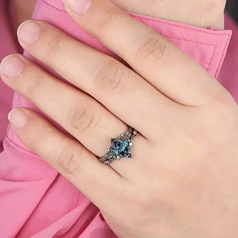 2-Piece Set: Gothic Black & Golden Engagement Ring Set with Pear-Shaped Cubic Zirconia DailySale