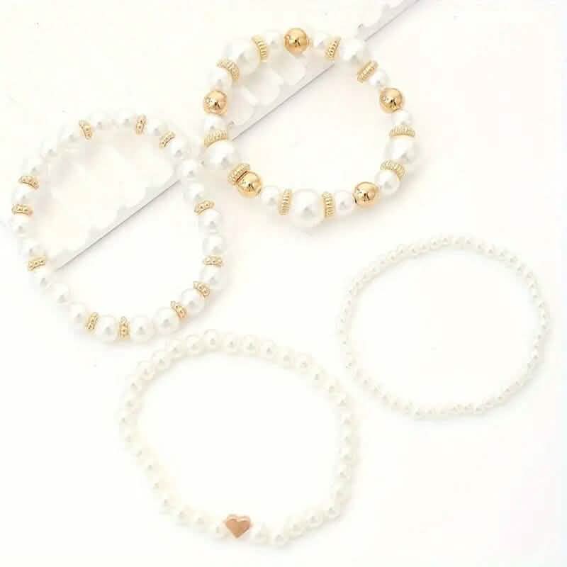 4-Pieces: Elegant White Faux Pearls Beaded Handmade Hand String Jewelry Set DailySale