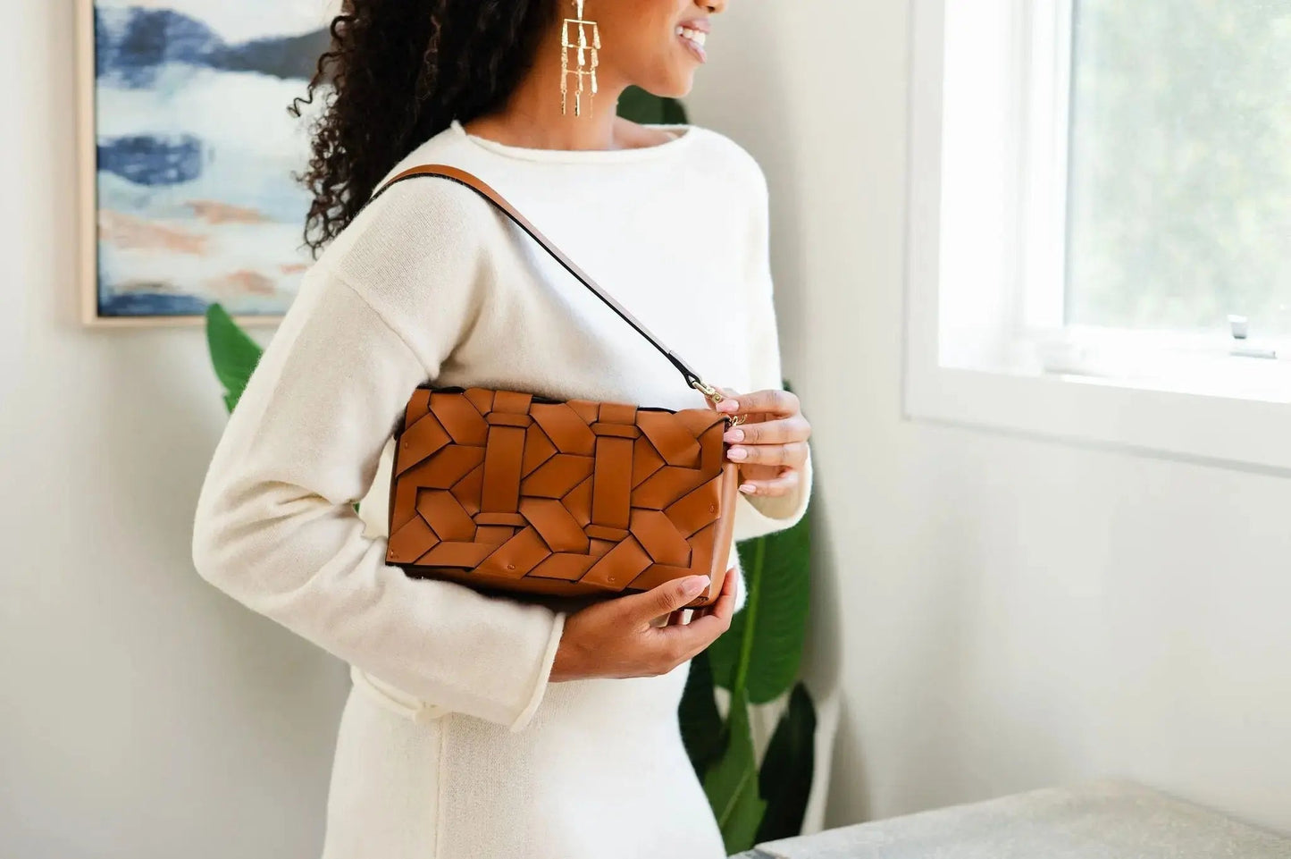 THE ZENOBIA WOVEN CLUTCH thebagicon