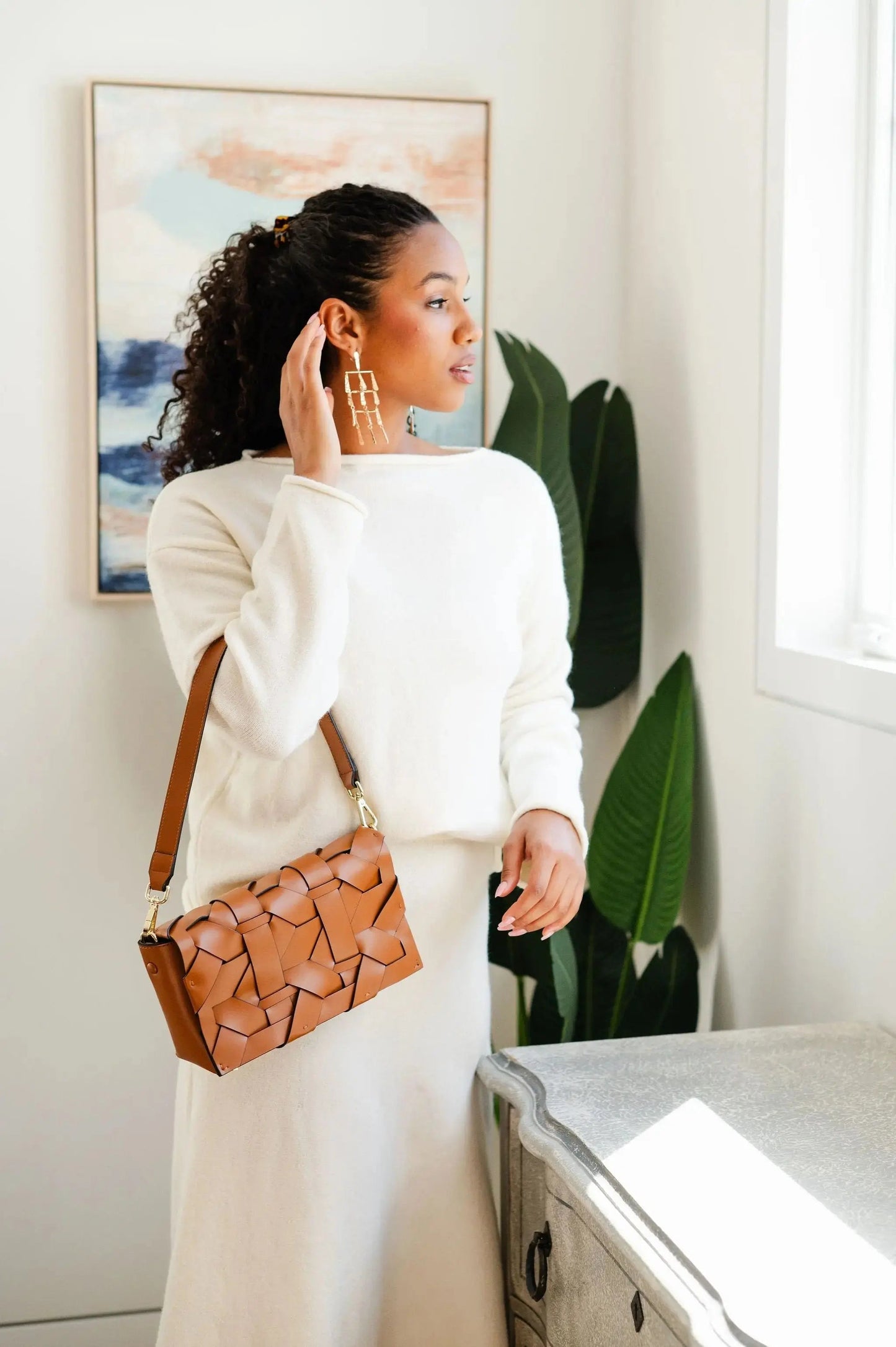 THE ZENOBIA WOVEN CLUTCH thebagicon