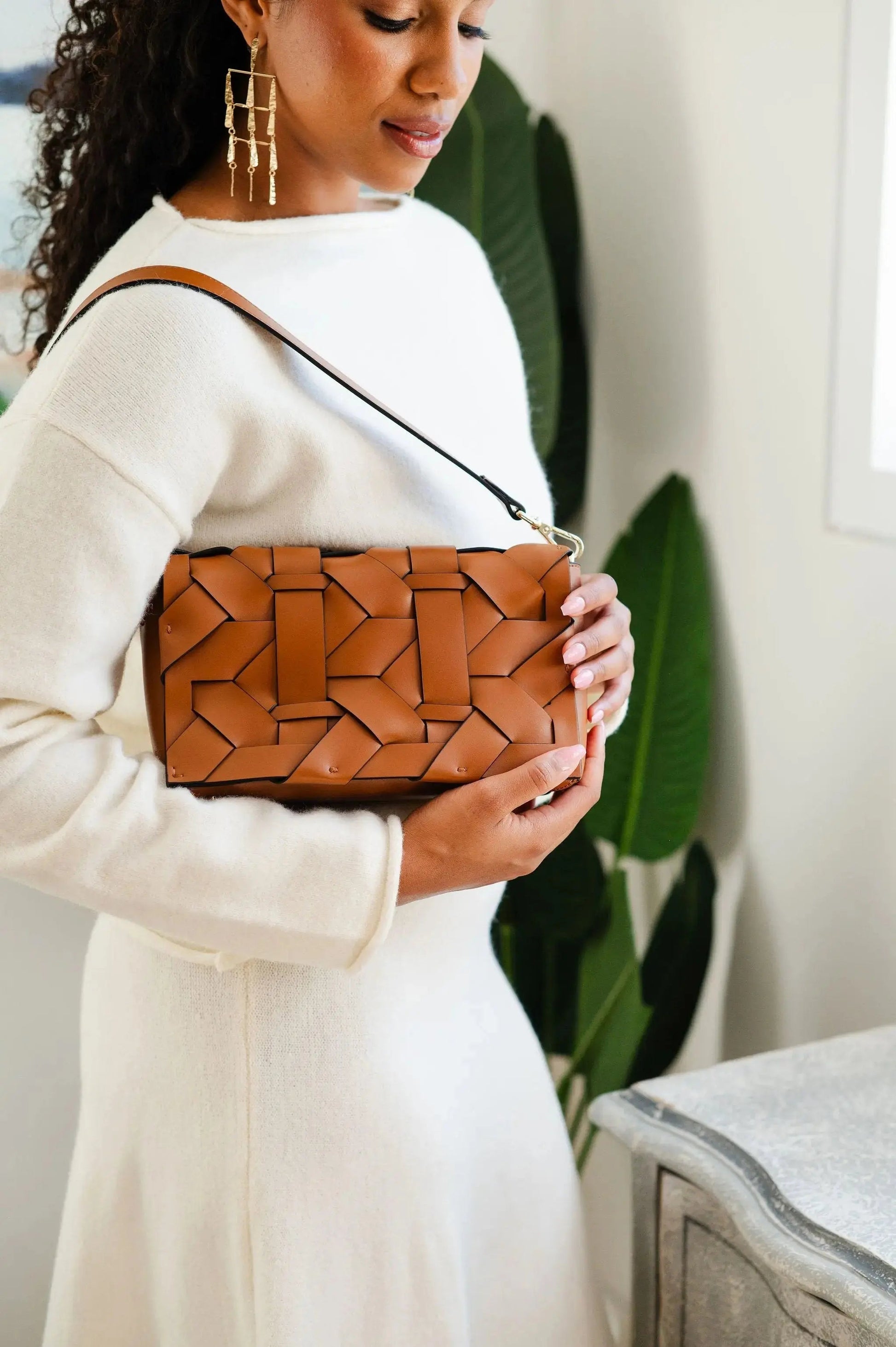 THE ZENOBIA WOVEN CLUTCH thebagicon