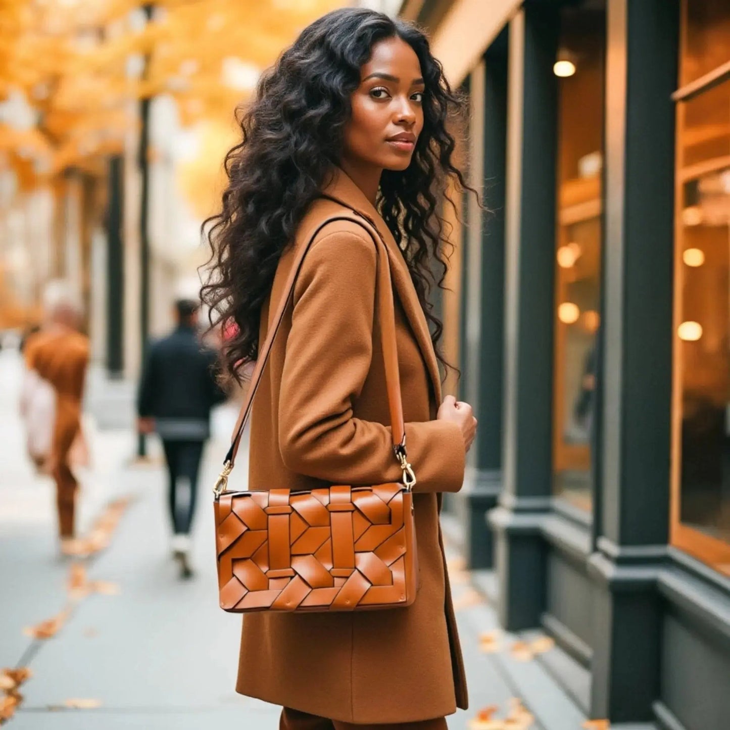 THE ZENOBIA WOVEN CLUTCH thebagicon