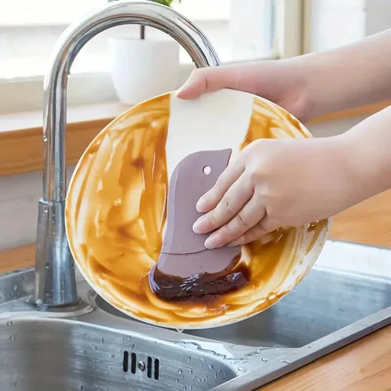 Penguin-shaped Soft Kitchen Stain Scraper Tool DailySale